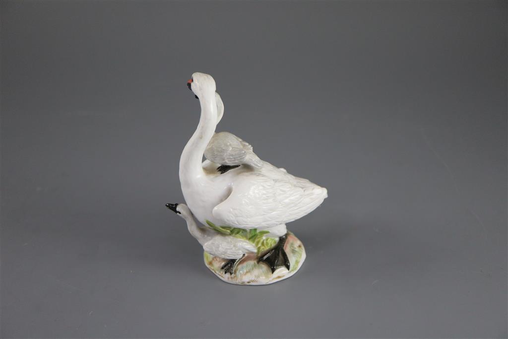 A Meissen group of a swan with cygnets, late 19th century, 13.5cm high